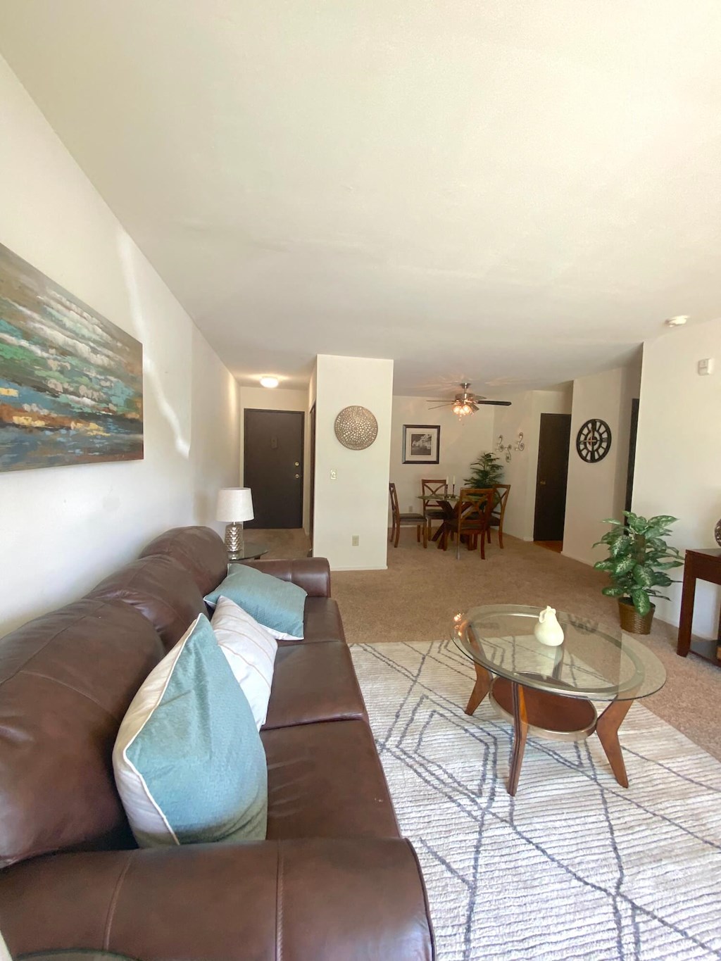 a living room with a couch and a table