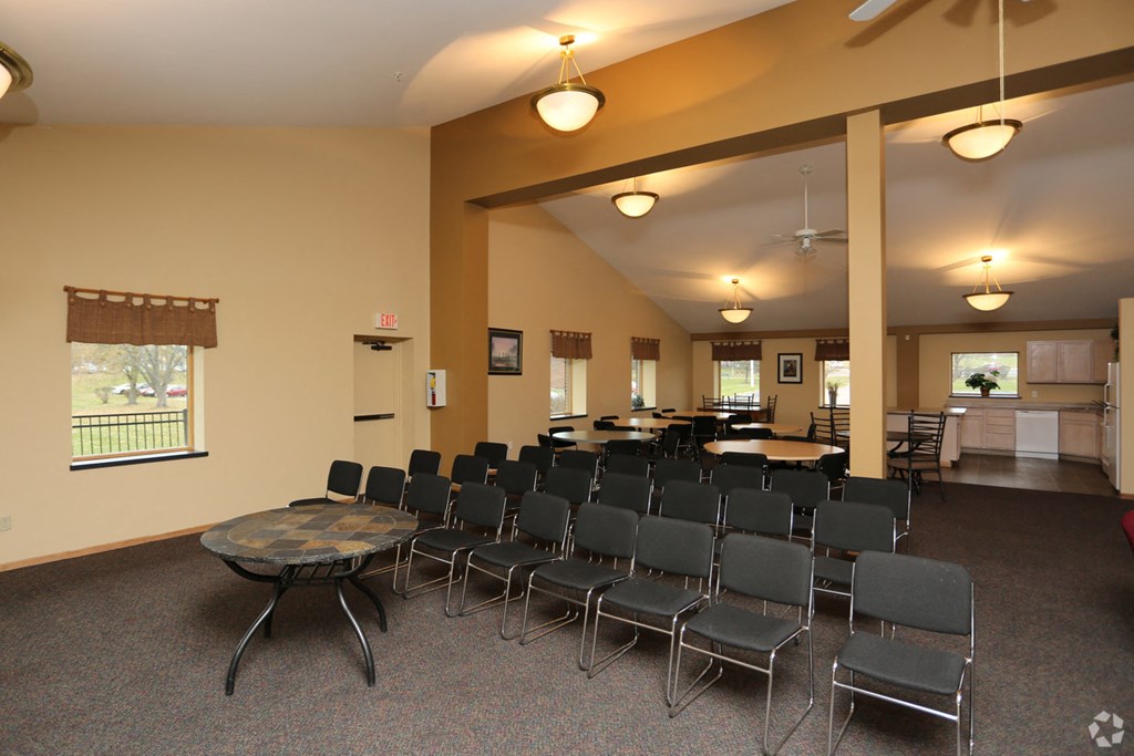a conference room with chairs and tables