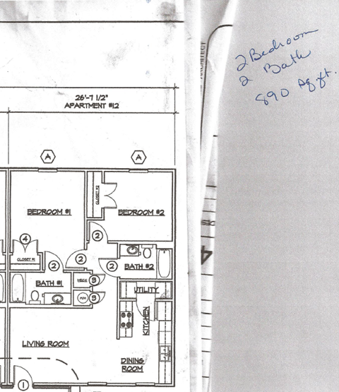 A drawing of a floor plan for a 2 bedroom apartment.