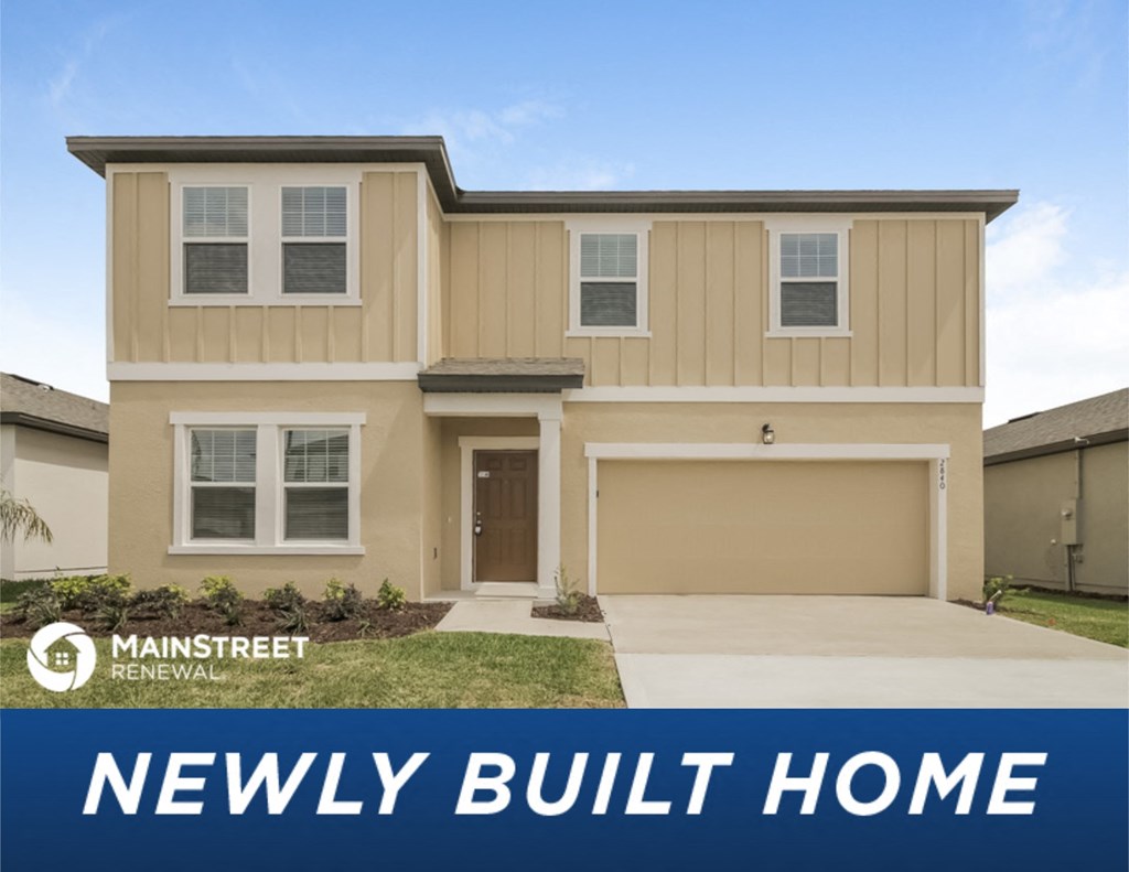 a new build home in front of a blue sky