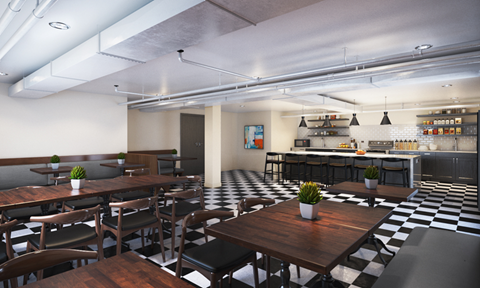 a dining room with tables and chairs and a bar