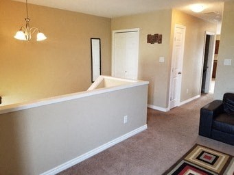 a living room with a couch and a bath tub in it