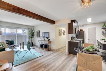Living Area With Kitchen View at Namaste Apartments, Las Vegas, 89102