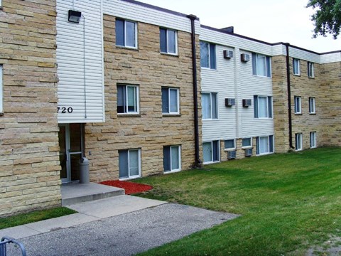 Apartment building with the number 720 on the front door.