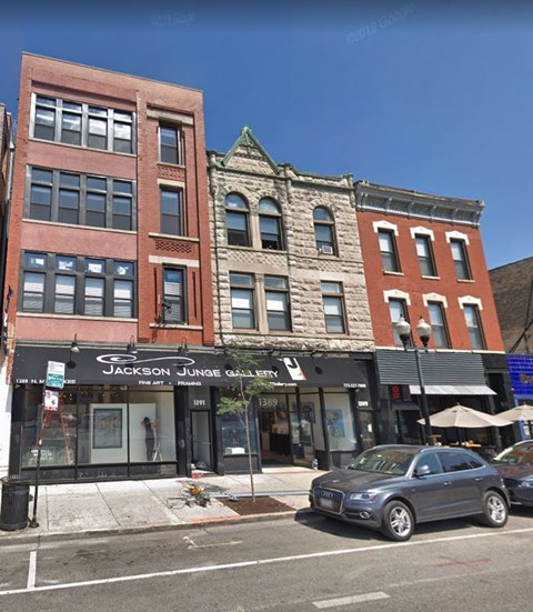a building on the corner of a city street