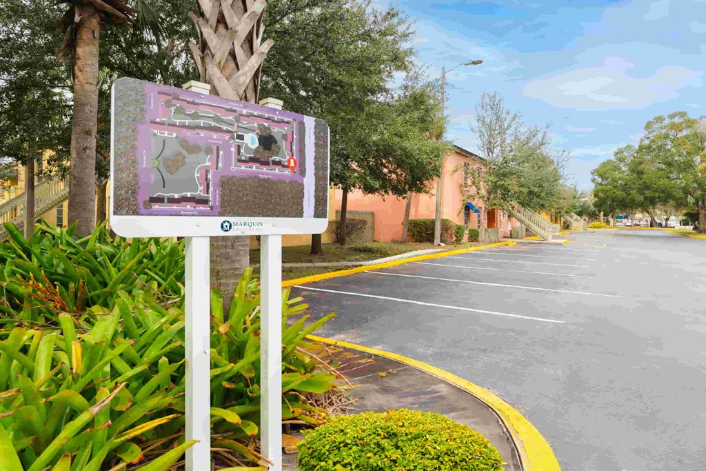 a voting sign on the side of a road