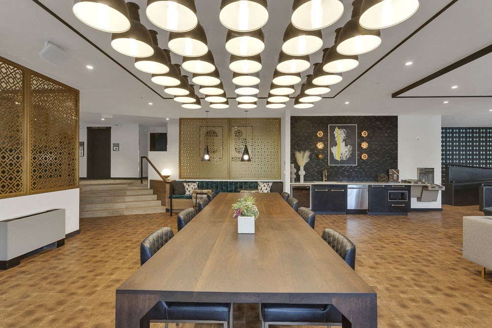 a large conference room with a large table and chairs