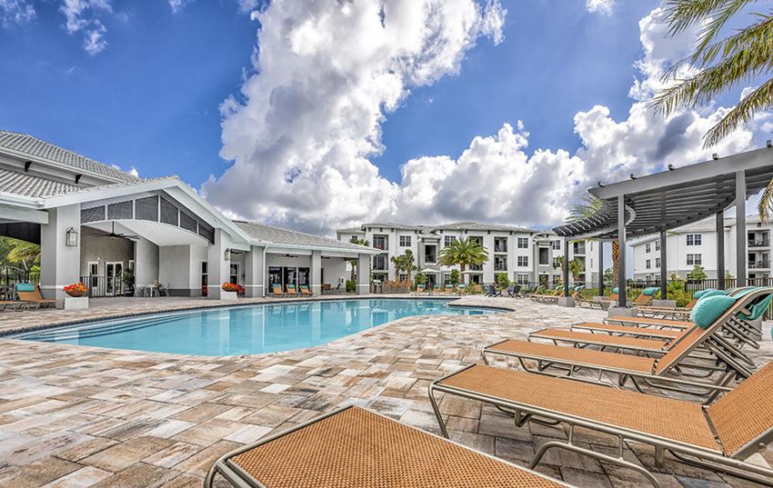 Coralina Apartments | Cape Coral, FL | Island-Style Lagoon Pool - Photo Gallery 1