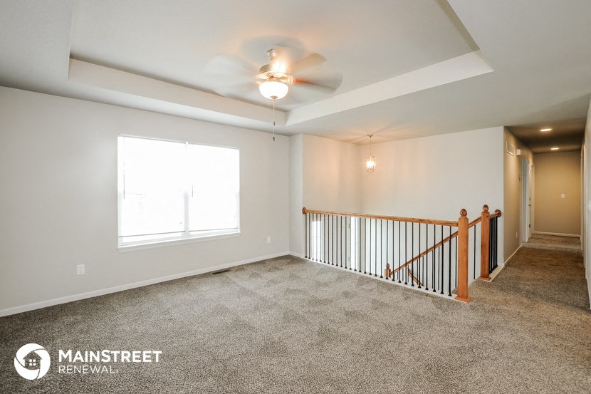 the living room is clean and ready to use