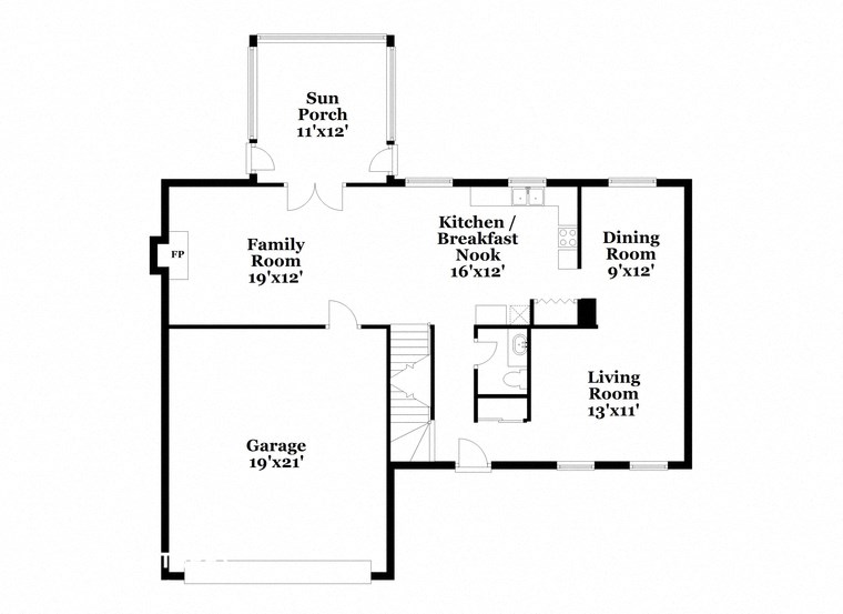 a floor plan of a house with two bedrooms and a living room and a kitchen