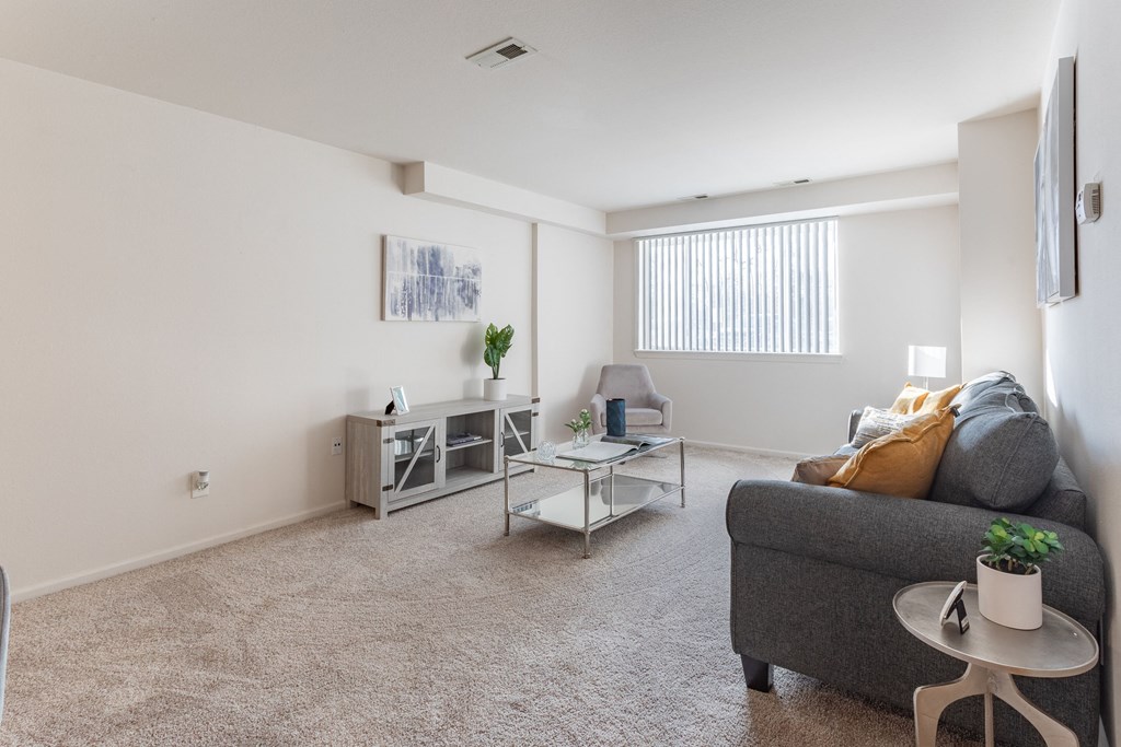 a living room with a couch and a coffee table