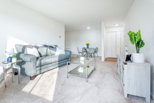 a living room with a couch and a table