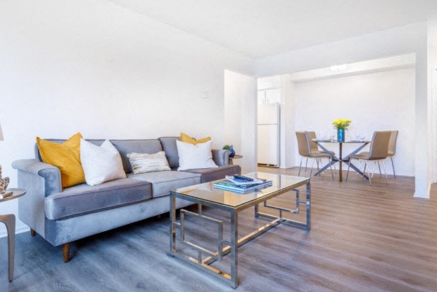 a living room with a couch and a table