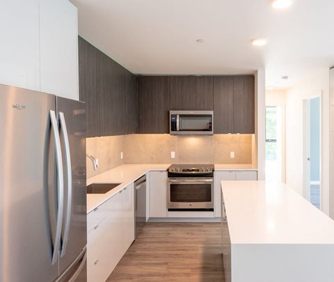 Wood-style Kitchen at 10 Clay Apartments
