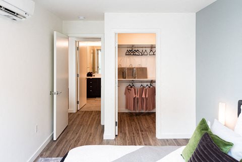 Spacious Bedroom With Large Closet and Wood Flooring at 10 Clay Apartments in Seattle, WA