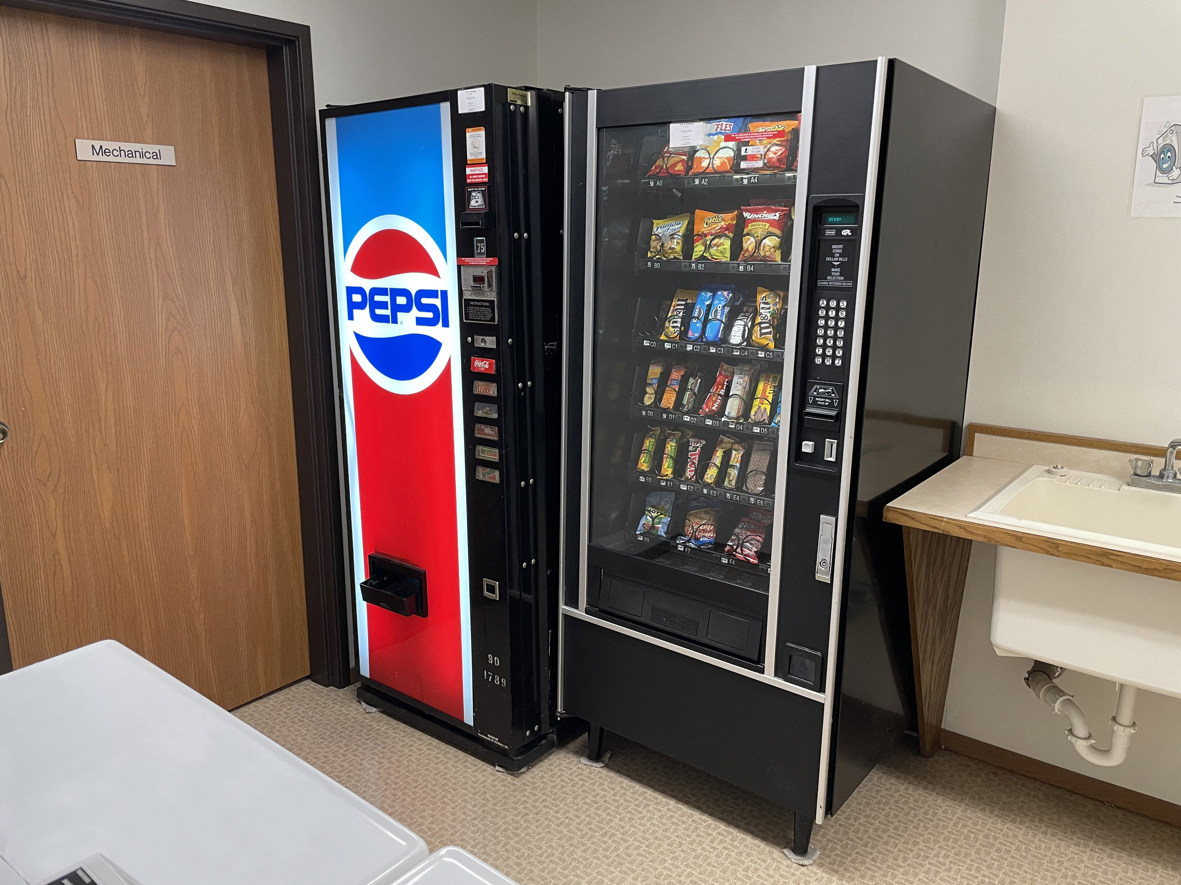 a vending machine in a hotel room