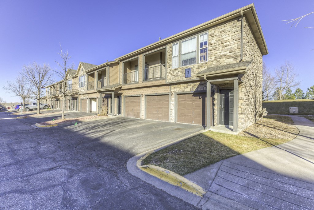 our apartments are located on the corner of a city street