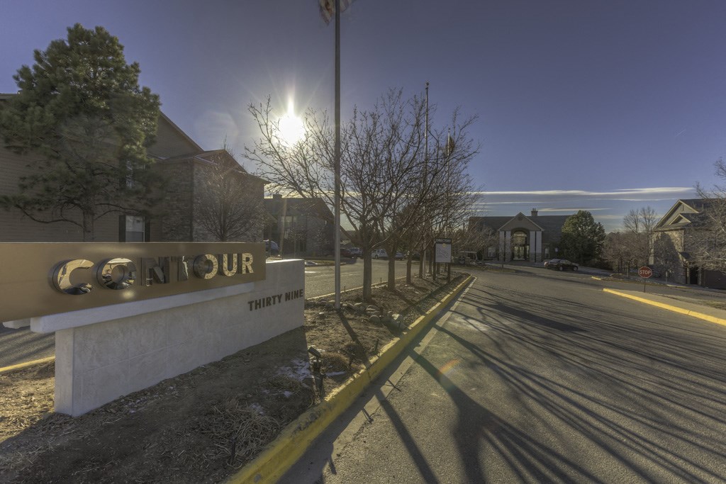 a sign that reads cantour on the side of a road
