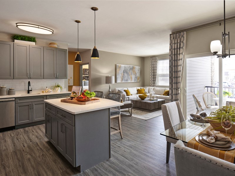 a kitchen and living room in a model home