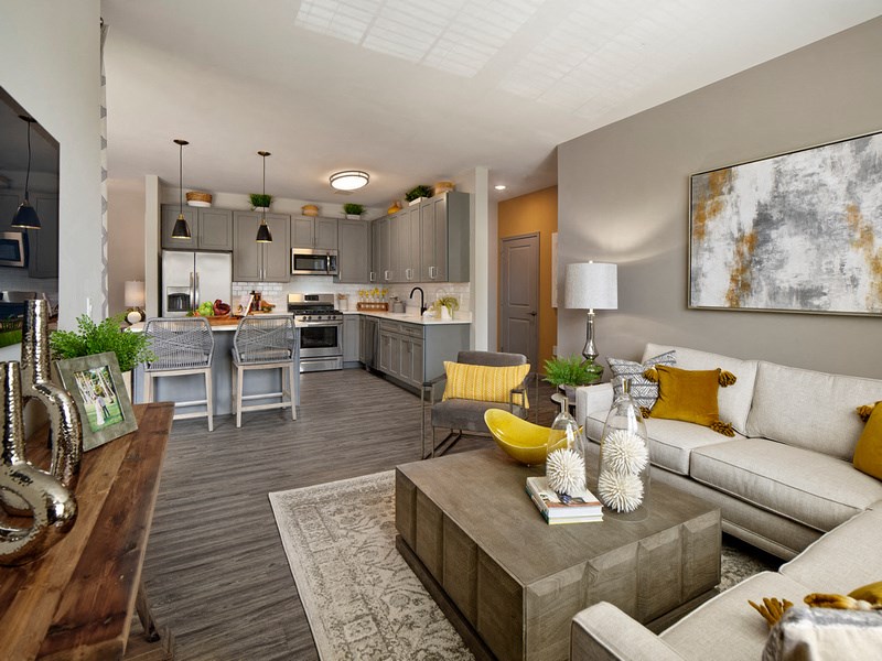 a living room and kitchen in a model home