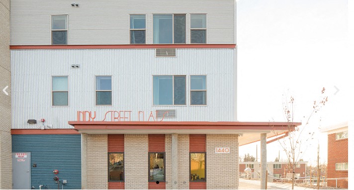 The front of a building with the number 1440 on it.
