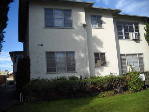 A white two-story building with the number 4535 on the front.