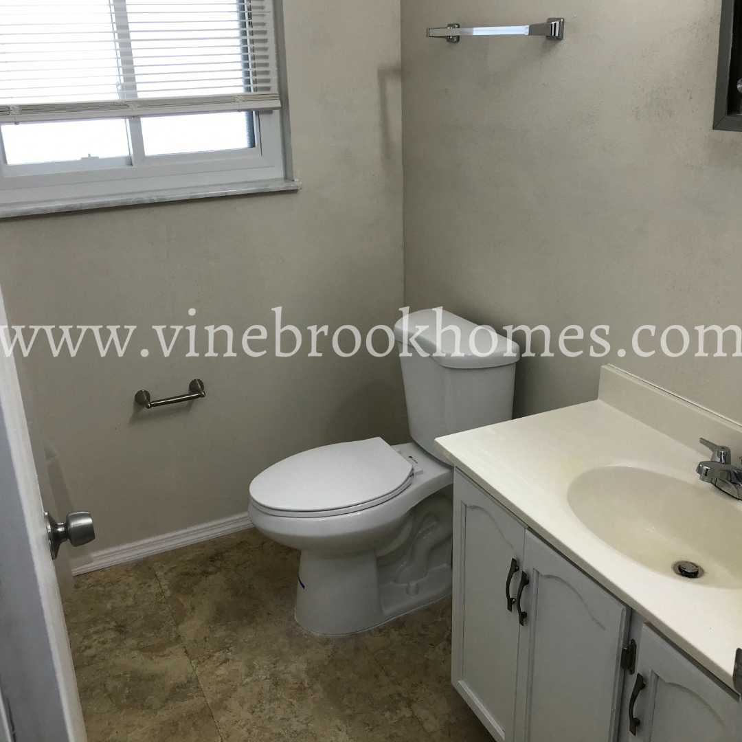 a small bathroom with a toilet and a sink