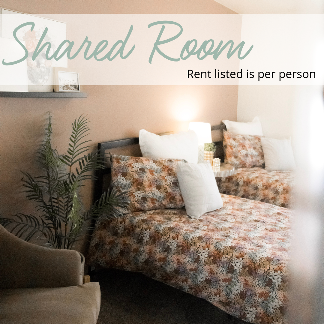 Shared bedroom with two beds to share