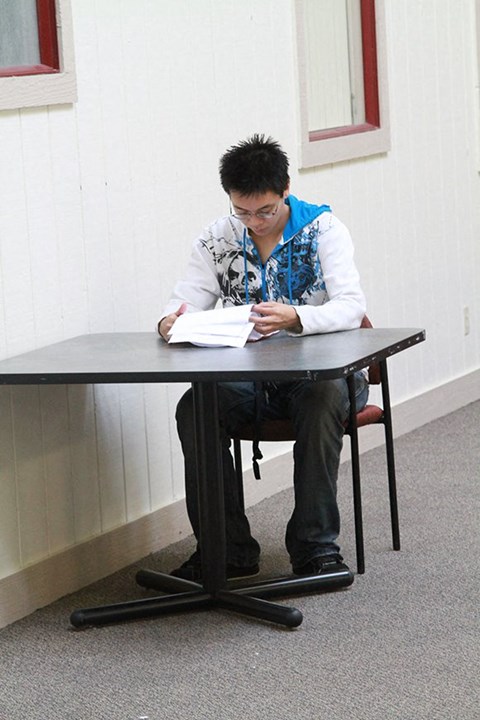 Student Studying at The Atriums in common study center
