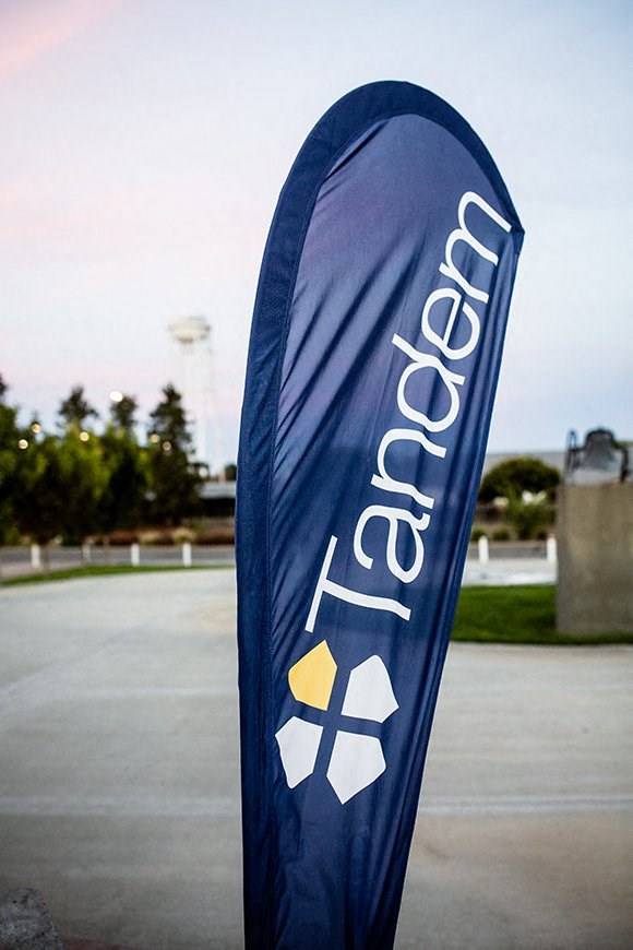 Tandem Properties flag near the office of The Atriums