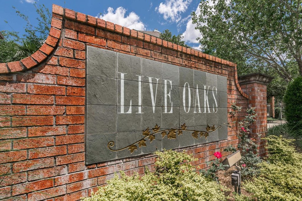 a brick wall with a live ones sign on it
