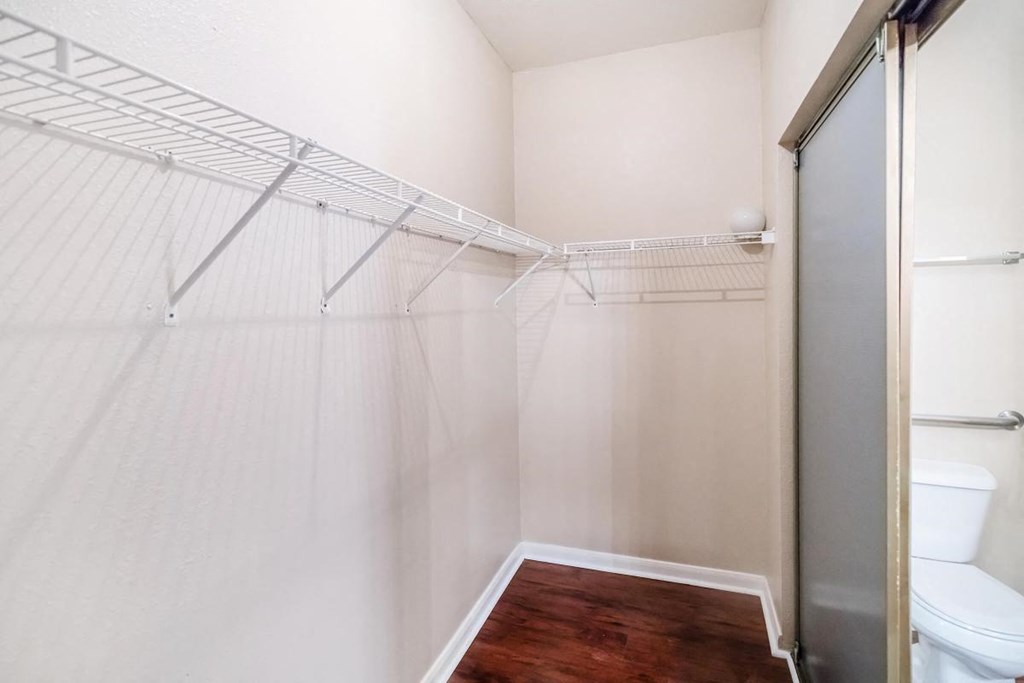 a bathroom with a shower and a toilet in it