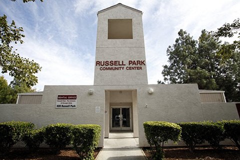 the front entrance of russell park community center with the door open