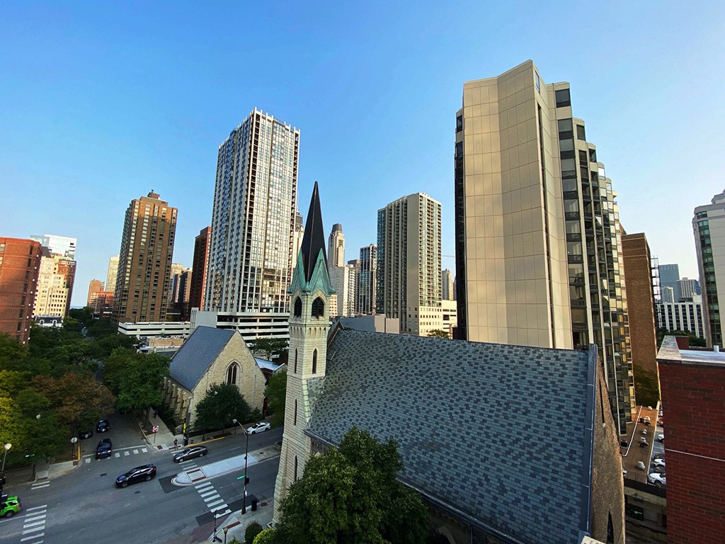 the view of the city from the roof of a church