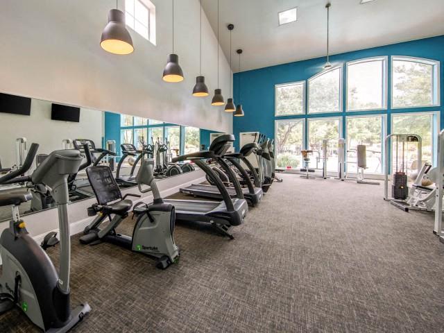 Fitness Center with cardio equipment and weight machines