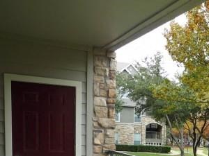 Apartments for Rent in Dallas Private Patio with view of green landscaping - Photo Gallery 5