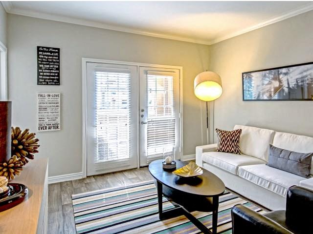 Large Living Rooms with high ceilings and hard wood floors