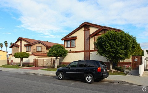a black van parked in front of a house