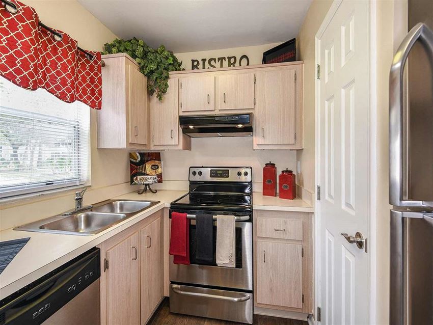 Kitchen with Window and Dishwasher and Stove - Photo Gallery 1