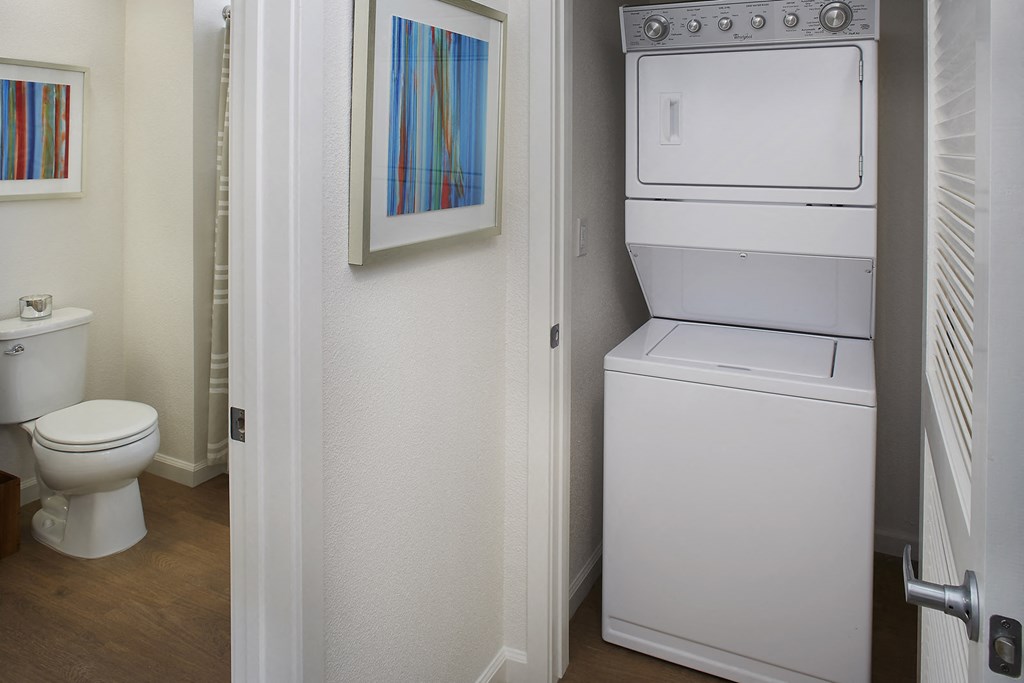 Washer/dryer closet adjacent to bathroom