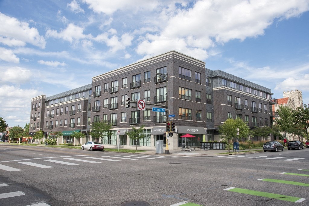 a building on the corner of a city street