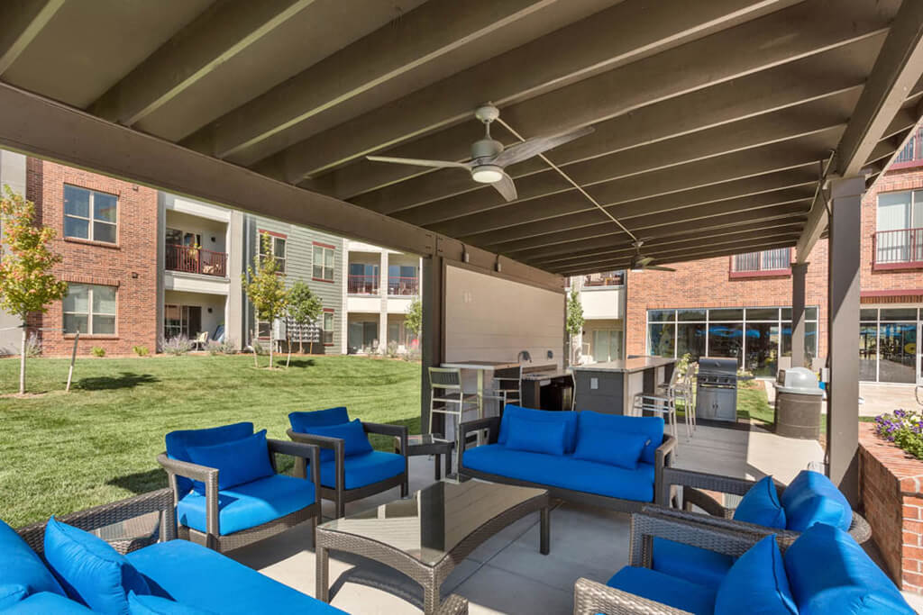 Westlake Greens Outdoor Kitchen and blue seating area