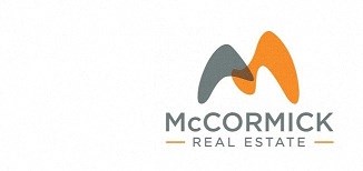 The image is a logo for McCormick Real Estate.