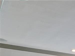 Clubroom with  comfortable tables for working or socializing a living room with a table and chairs