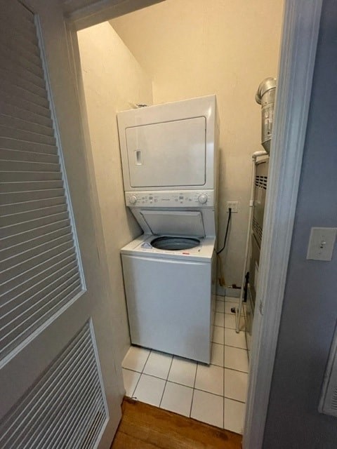a small bathroom with a toilet and a washing machine