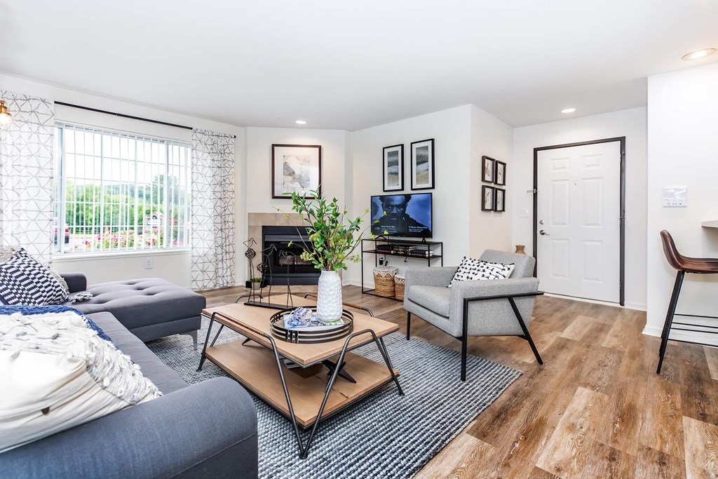 a living room with a couch and a table