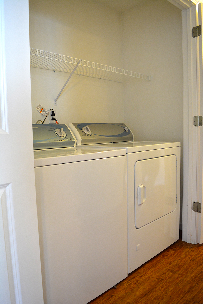 side by side top load washer and front load dryer
