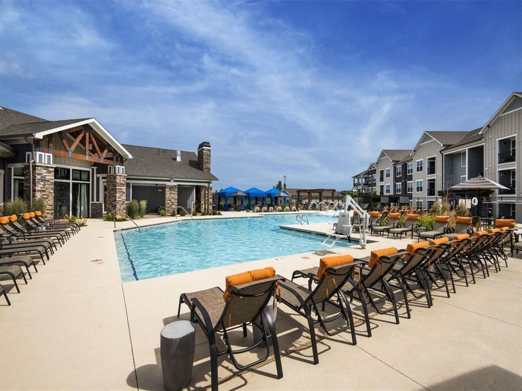 Pool With Sunning Deck at Watermark at Harvest Junction, Longmont, CO