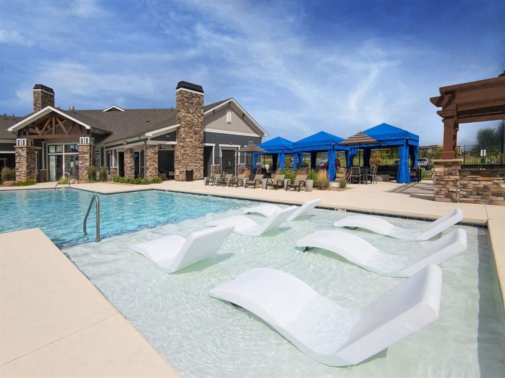 Poolside Sundeck With Relaxing Chairs at Watermark at Harvest Junction, Longmont, 80501