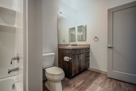 a bathroom with a toilet and a sink